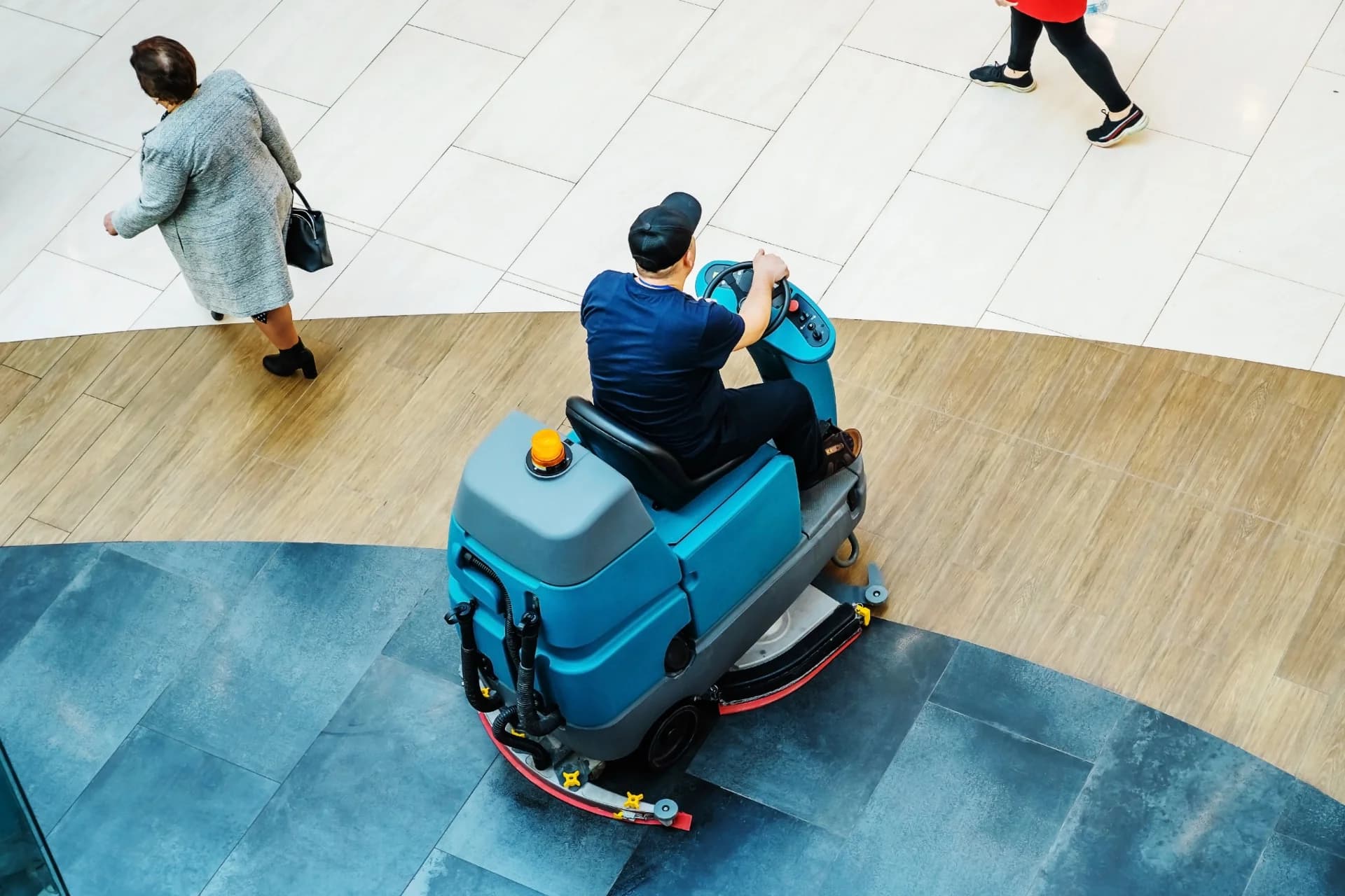 Commercial cleaner maintaining a retail storefront entrance in Austin